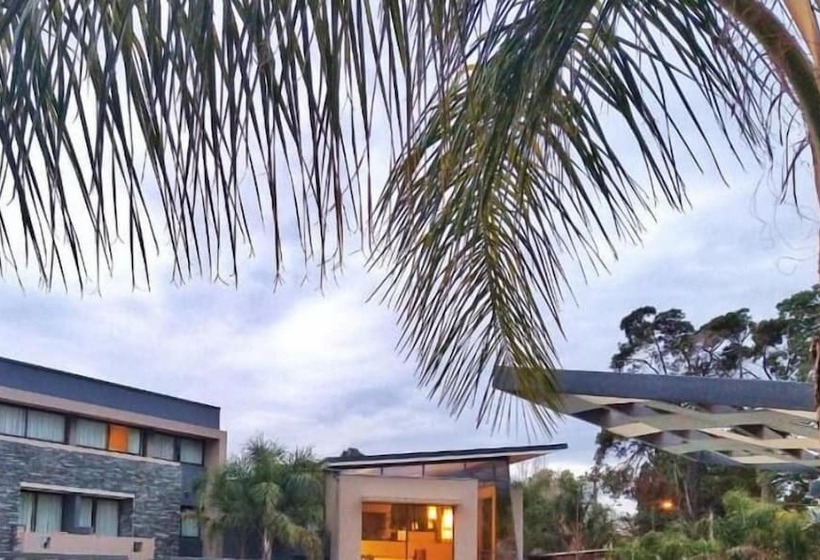 Отель Altos De Merlo Suites