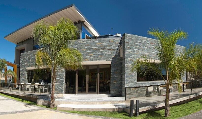 Отель Altos De Merlo Suites