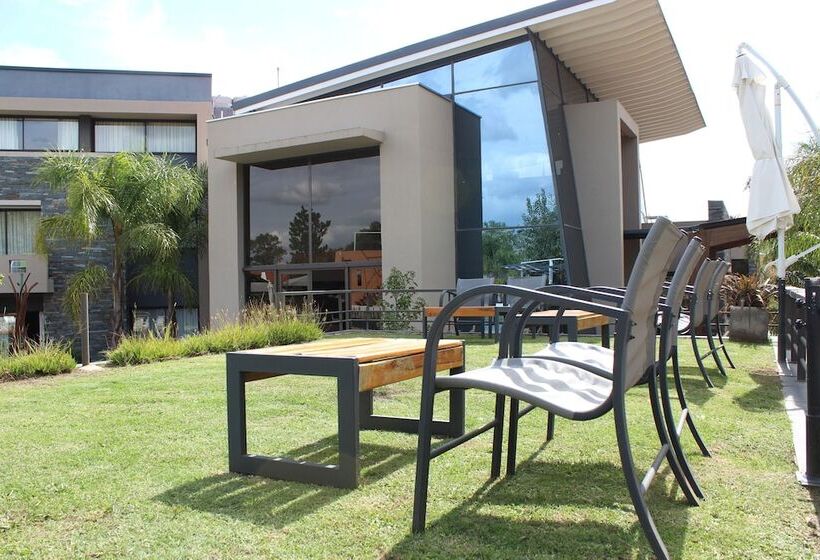 Отель Altos De Merlo Suites