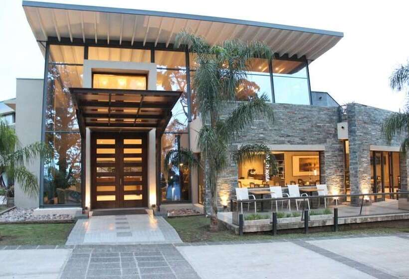 Отель Altos De Merlo Suites