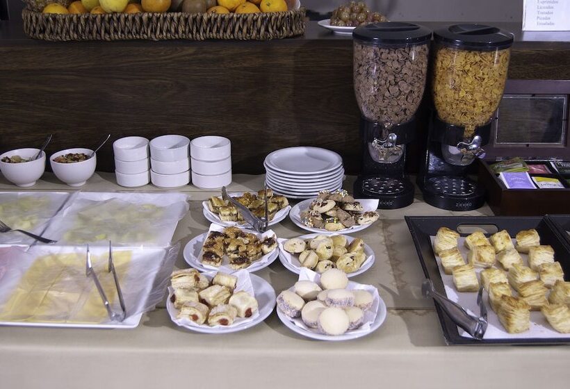 Отель Altos De Merlo Suites