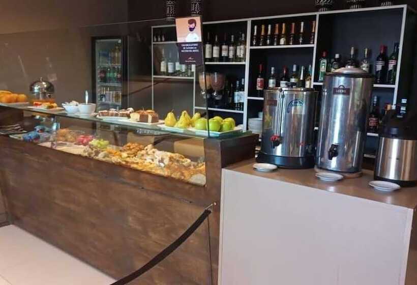 Отель Altos De Merlo Suites