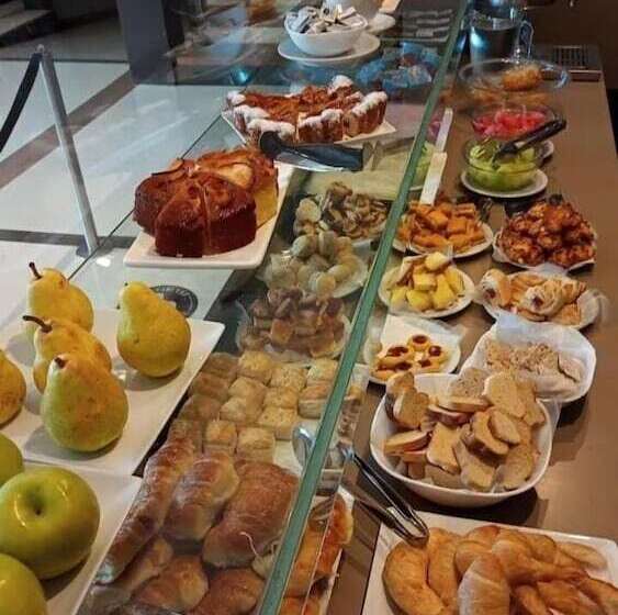 Отель Altos De Merlo Suites