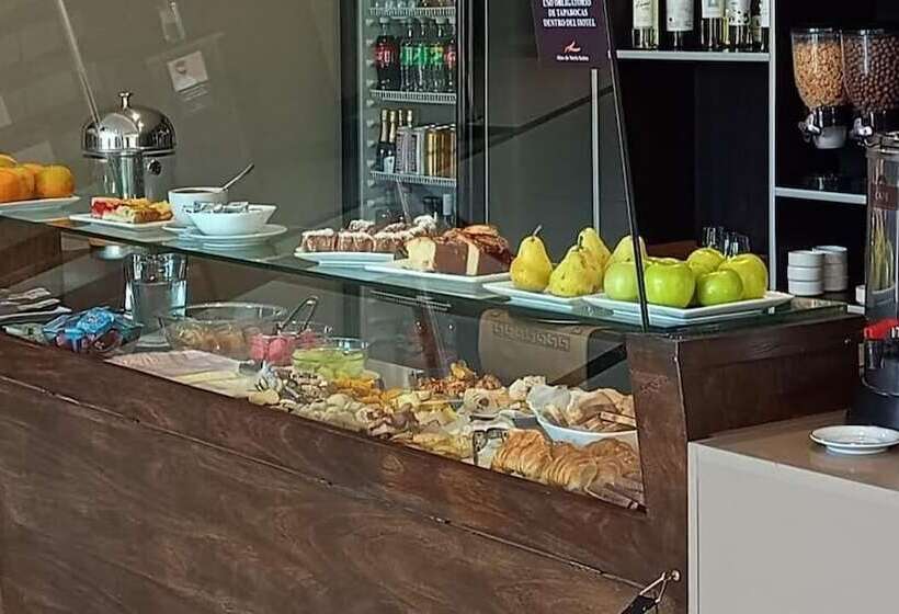 Отель Altos De Merlo Suites