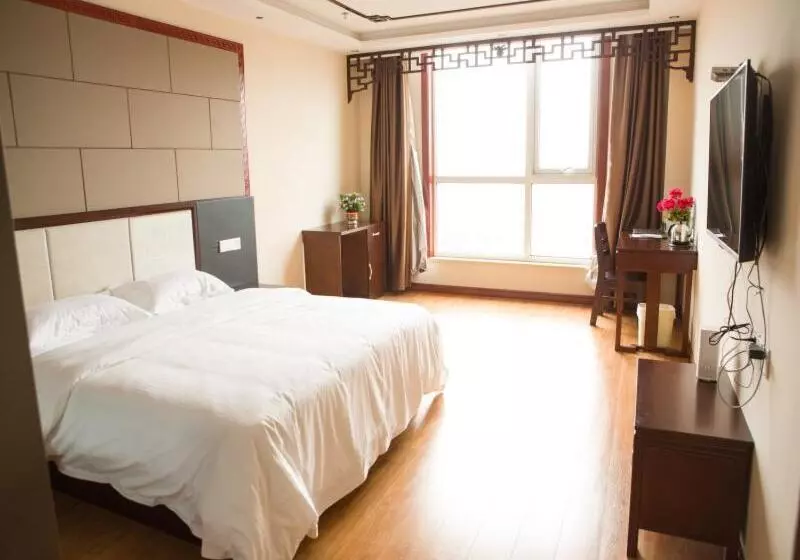 Hotelli Greentree Inn Shandong Zaozhuang Shanting Jinkeguoji Yijiaren Business