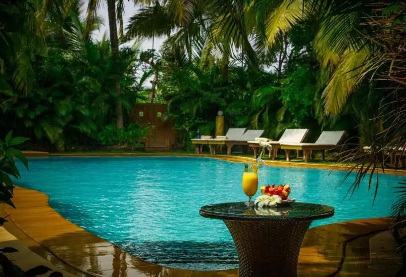 ホテル Papa Jolly Eco Resort Near Morjim Beach