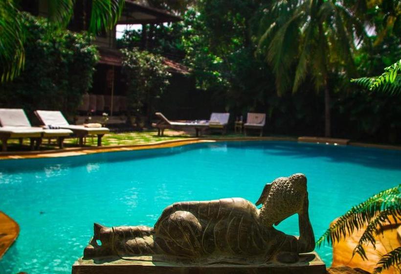 Hotel Papa Jolly Eco Resort Near Morjim Beach