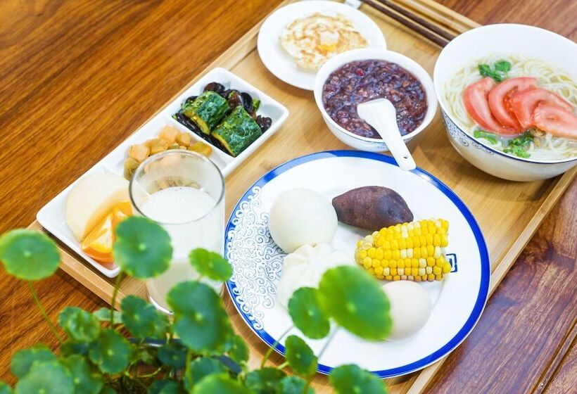 هتل Lijiang Qilu Garden