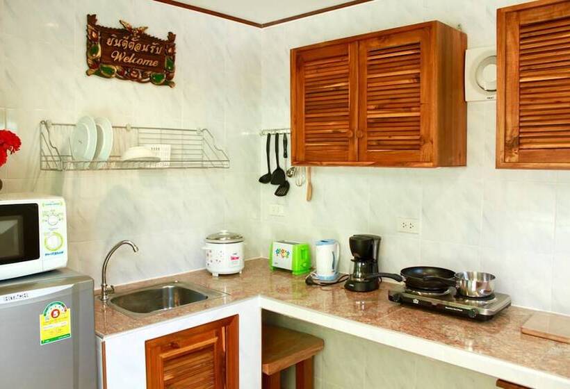 호텔 New Paradise Home Resort