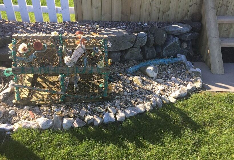 Door To The Shore Seafront Cottages