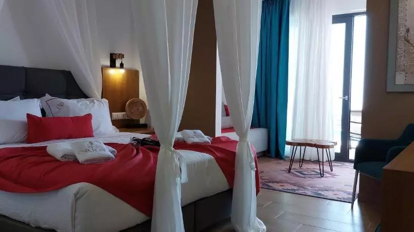 Cavo Orient Beach Hotel & Suites