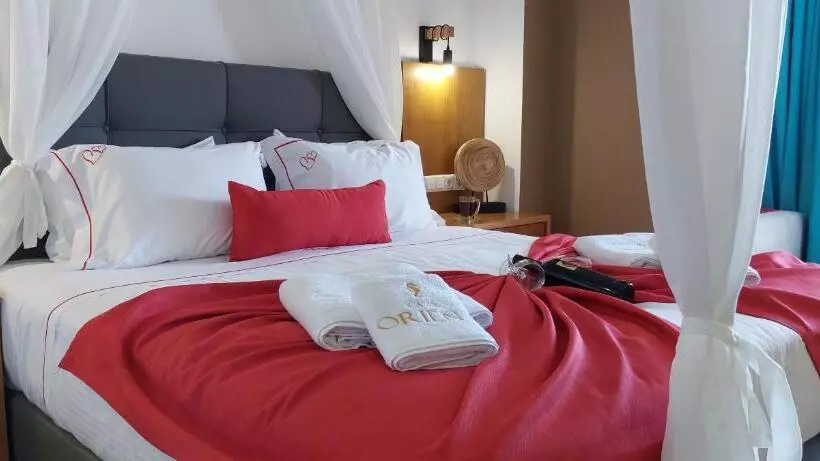 Cavo Orient Beach Hotel & Suites