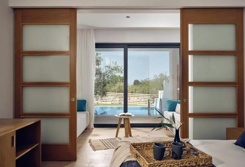 Cavo Orient Beach Hotel & Suites
