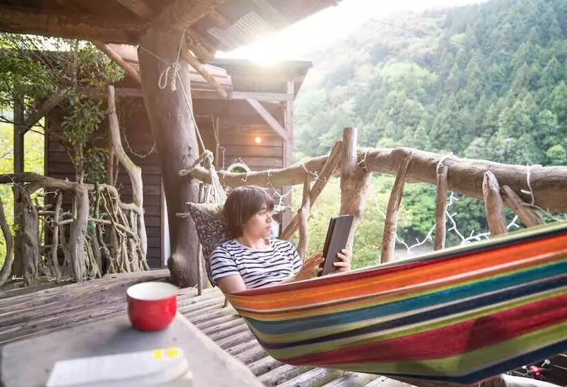 ペンション Guesthouse Momonga Village   Hostel