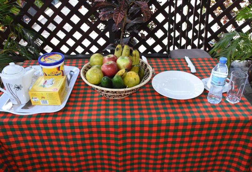 تختخواب و صبحانه Travellers Home