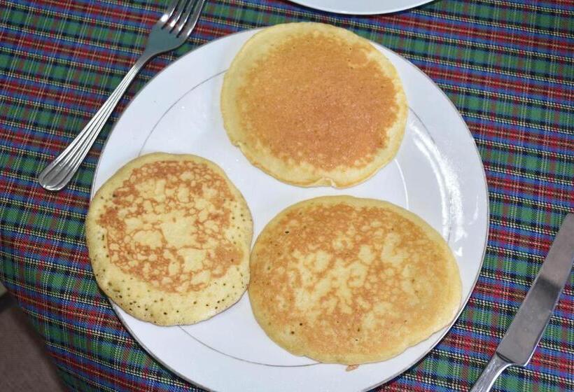 تختخواب و صبحانه Travellers Home