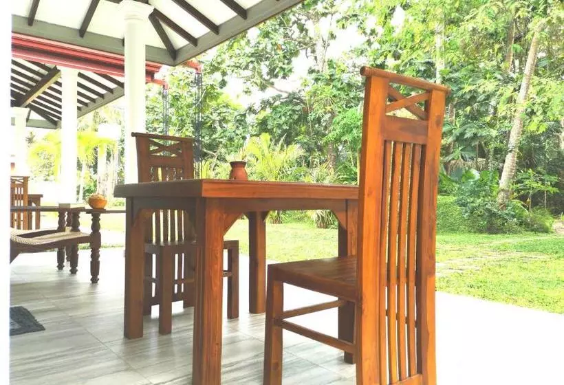 تختخواب و صبحانه Abhimani Bungalows