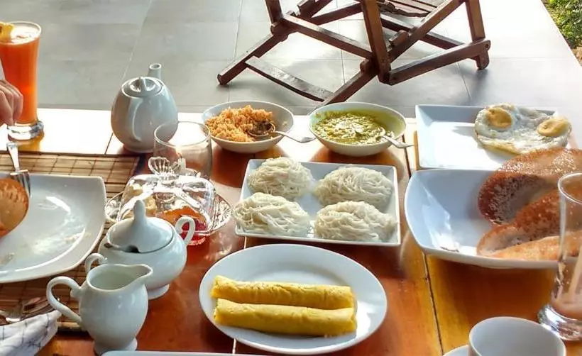 تختخواب و صبحانه Abhimani Bungalows