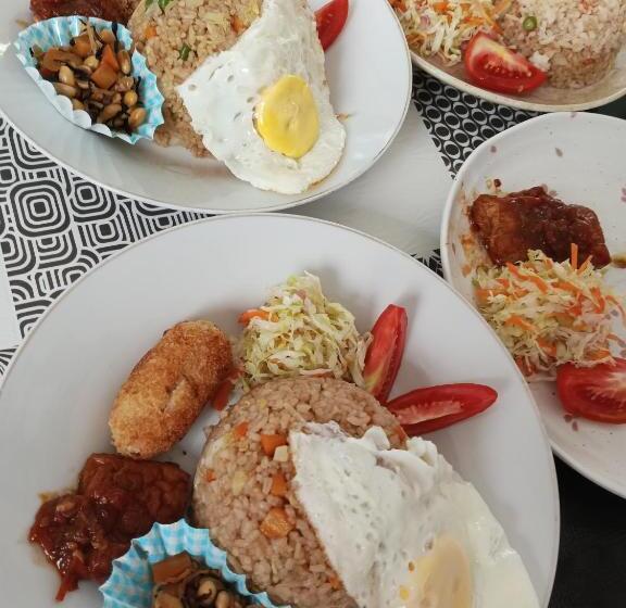 פנסיון Mjr Ticketing Guest House