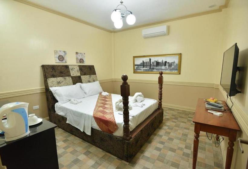 הוסטל Roz And Angelique S Inn & Suites