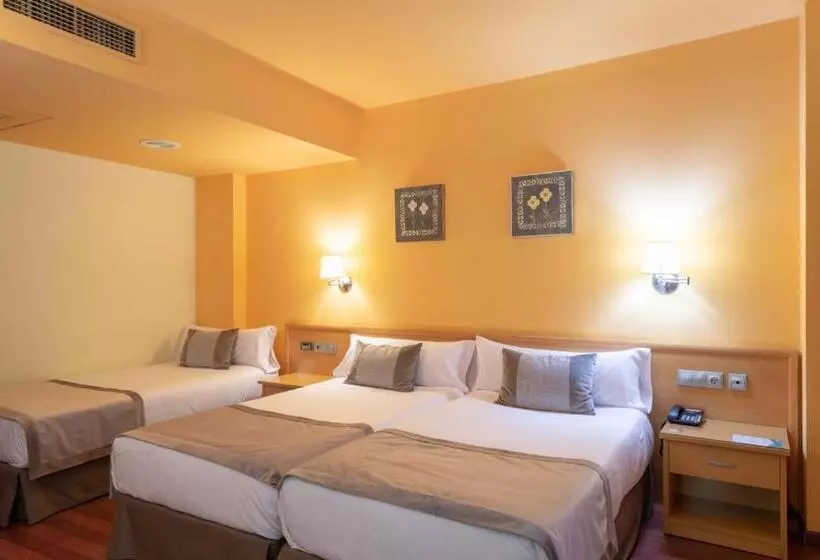 Chambre Triple Standard, Real
