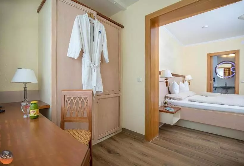 اتاق استاندارد با چشم‌انداز باغ, Flairhotel Am Wörthersee