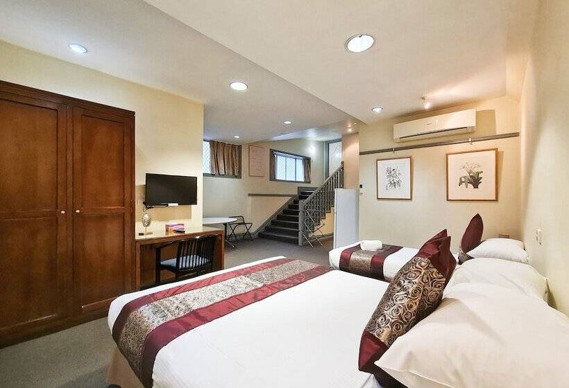 חדר אקונומי, Twin Towers Inn