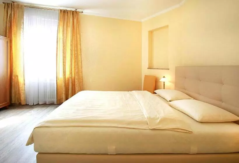Quarto clássico, Garni Golf