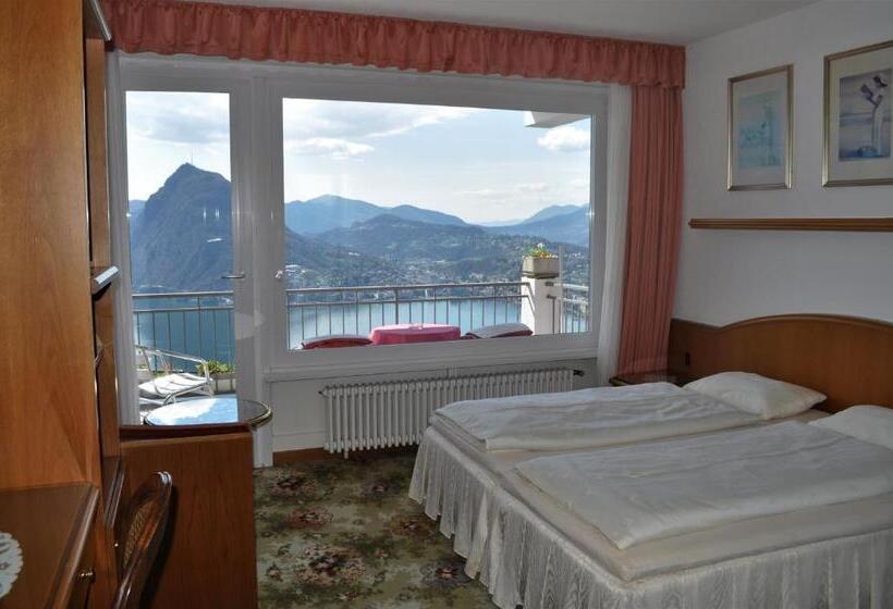 Quarto Estandar Vista Lago, Colibrì