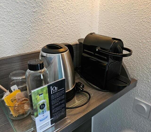 מיטת קינג בסוויטה, Hôtel Le Rohan Charme Et Caractère