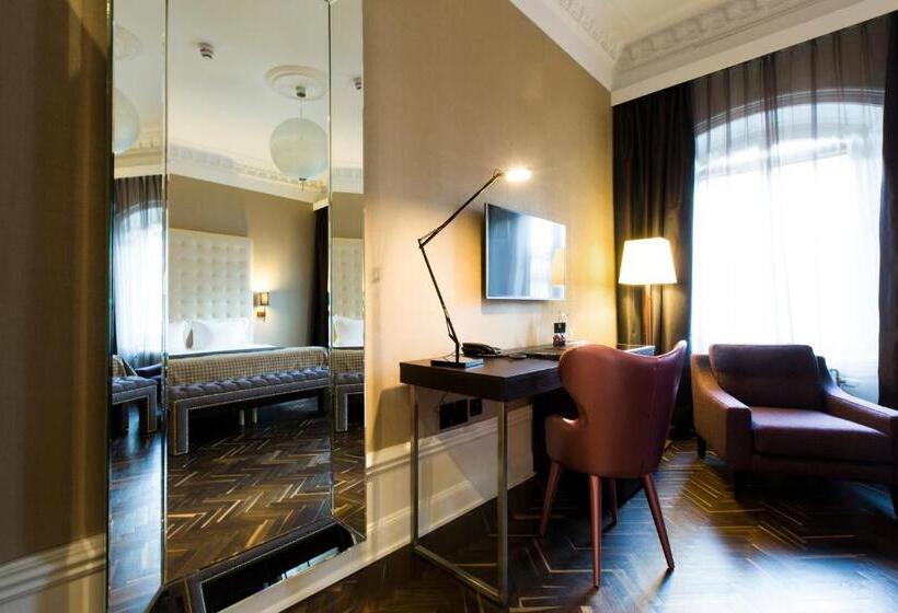 キングサイズベッドのデラックスルーム, Elite Hotel Adlon