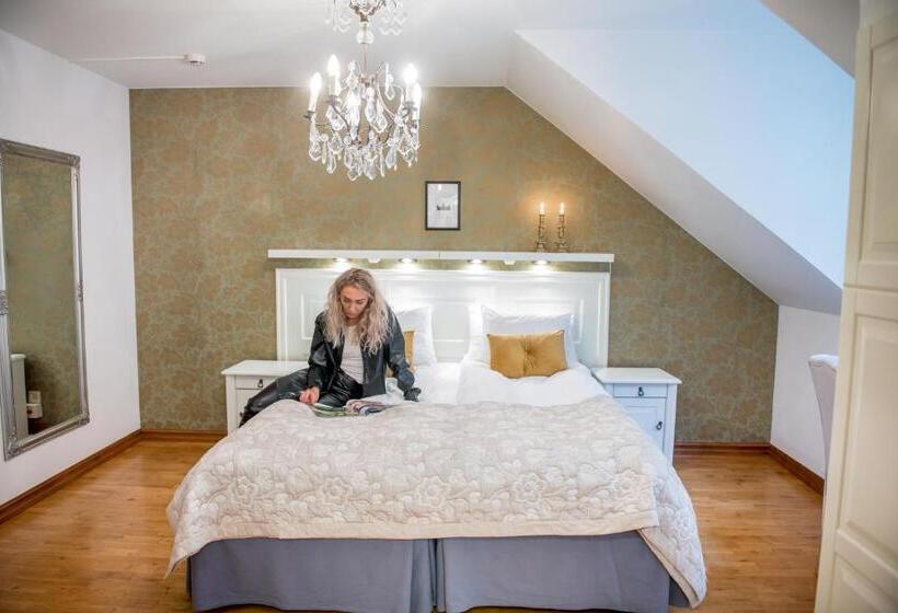 חדר סופריור לארבעה, Slottshotellet