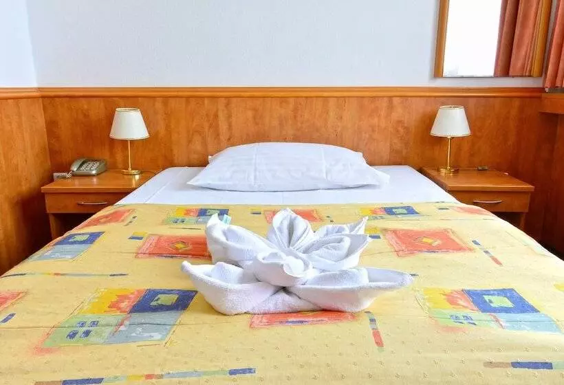 Quarto Estandar Individual, Olympik