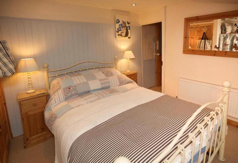 חדר משפחתי, Vine Cottage