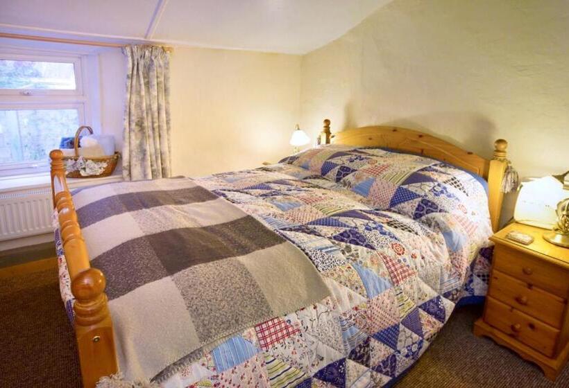 חדר משפחתי, Vine Cottage