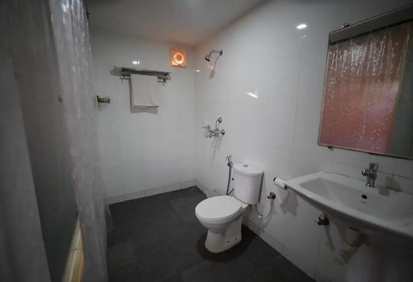 Quarto deluxe vista mar com balcao, Sunset & Waves Resort