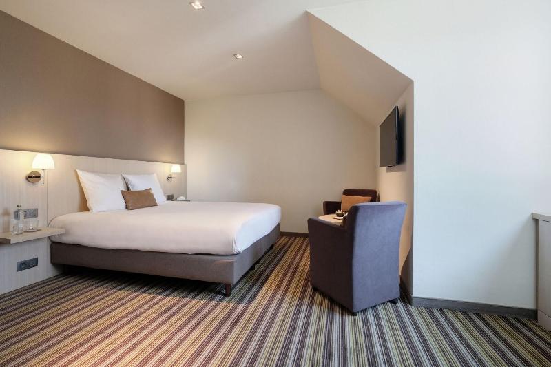 キングサイズベッドのスイートルーム, Best Western Plus Ambassador Suites