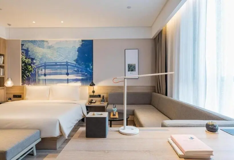 Deluxe-huone, Atour