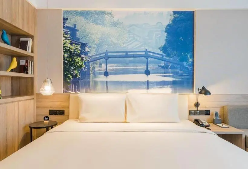 Deluxe-huone, Atour