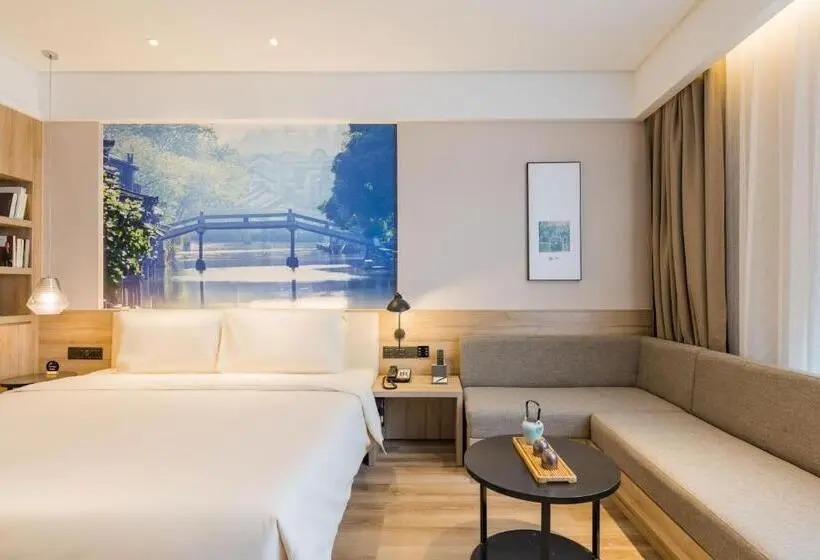 Deluxe-huone, Atour