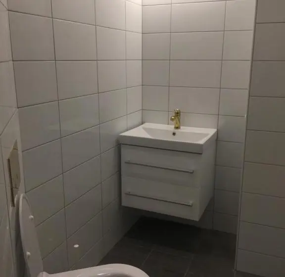 Delüks Oda, Holsthuset Losji