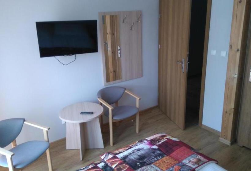 غرفة عائلية, Maczek