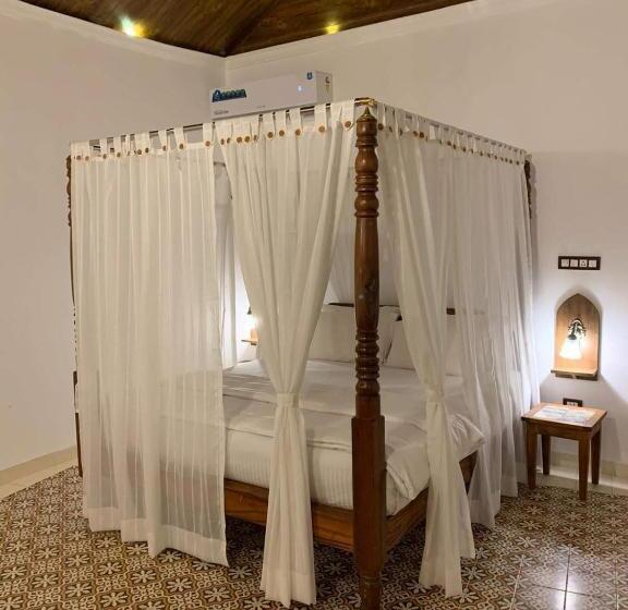 جناح ديلوكس سرير كينج, Porsu