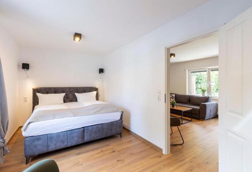 庭の見える1ベッドルームアパートメント, Butz