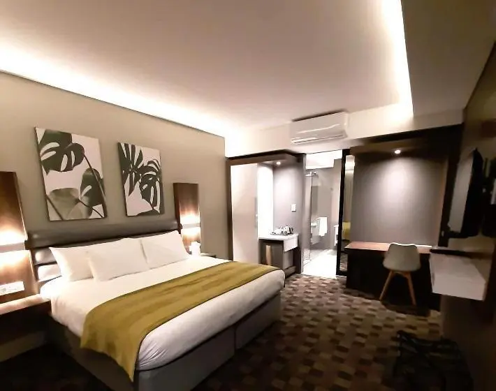 キングサイズベッドのデラックスルーム, Copperwood Hotel And Conferencing