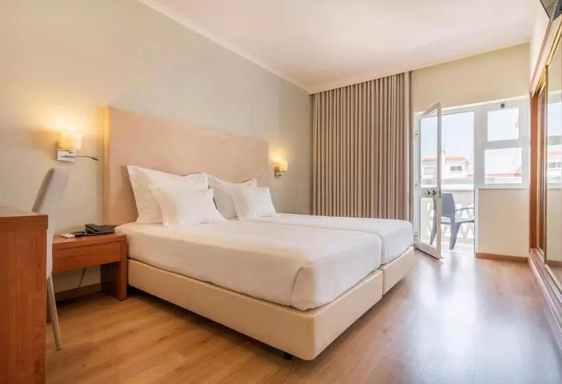 Comfort room with balcony, Baía Beach