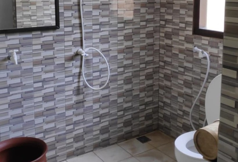 Кровать в Общей Комнате, Homestay Rahayu
