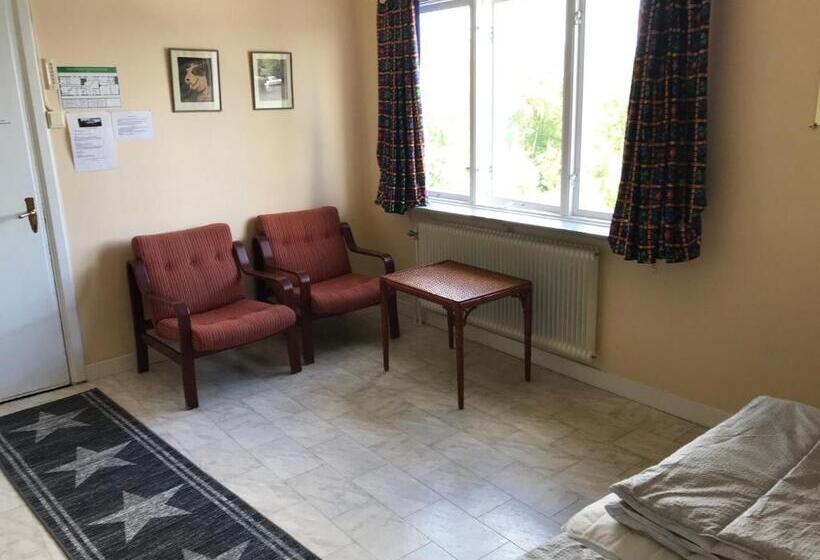 חדר סטנדרטי לארבעה עם חדר אמבטיה משותף, Fegens Vandrarhem