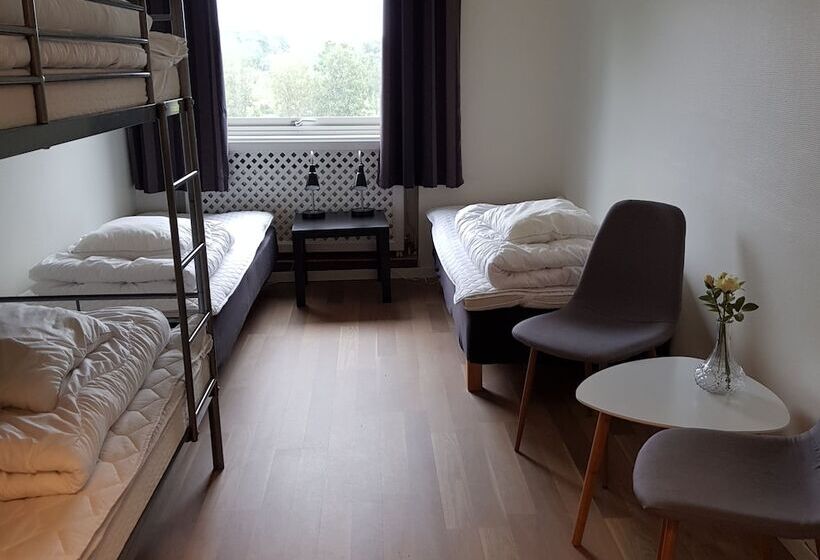 חדר סטנדרטי לארבעה עם חדר אמבטיה משותף, Alkoven Logi