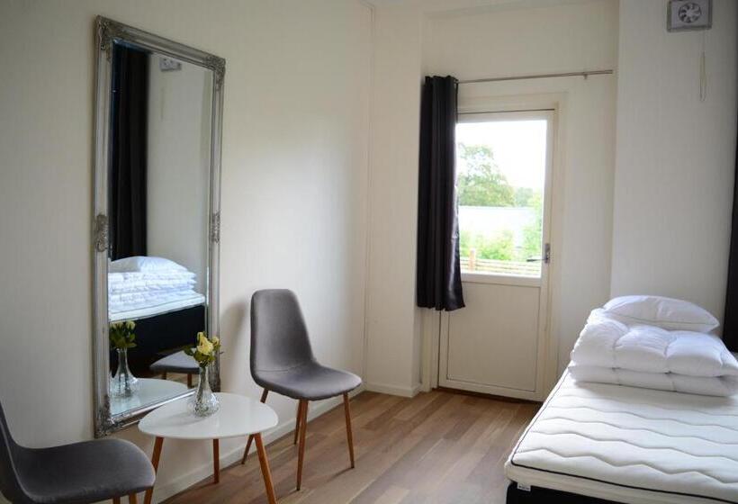 חדר משפחתי חדר אמבטיה משותף, Alkoven Logi